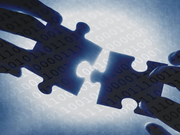 Two puzzle pieces fitting together against a backdrop of binary code â€” illustrating how protection drops in at the stable point of a modern JavaScript build pipeline